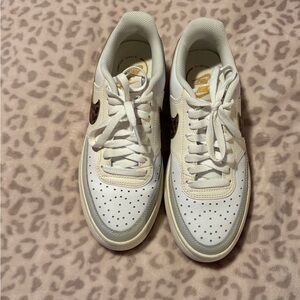 Nike Sneakers with leopard print logo